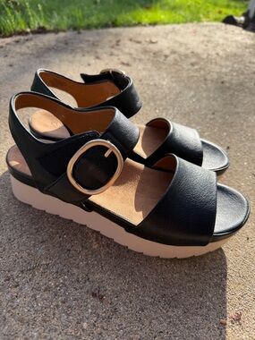 eurosoft black platform sandals with gold buckle